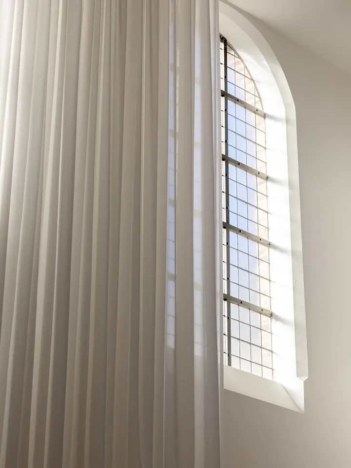 Rays of sunlight...

@abbykortrijk dressed with custom-woven FR curtains by Verilin.

The curtains beautifully frame the remarkable height of the chapel, softening the monumental architecture while allowing daylight to become part of the interior...

A balanced play between transparency, shadow and glow... 

Project from A to Z by Verilin.

Contact info@verilin.be to discover the possibilities for your project.
Visit our showroom by appointment.

Photography by @annick_vernimmen_photography